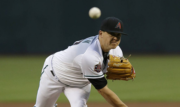 Arizona Diamondbacks pitcher Kris Medlen throws in the first inning of a baseball game against the ...