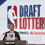 NBA Deputy Commissioner Mark Tatum announces that the Memphis Grizzlies won the fourth pick during the NBA basketball draft lottery Tuesday, May 15, 2018, in Chicago. (AP Photo/Charles Rex Arbogast)