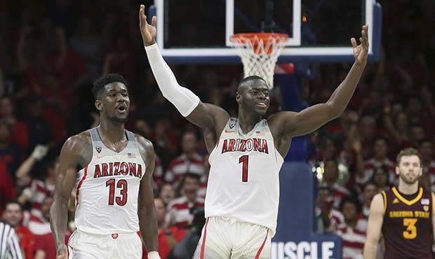 Arizona's Rawle Alkins (1) and Deandre Ayton (13) celebrate during the final seconds of the team's ...