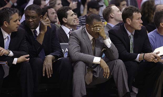Phoenix Suns coach Alvin Gentry, third from left, and assistants, from left, Igor Kokoskov, Bill Ca...