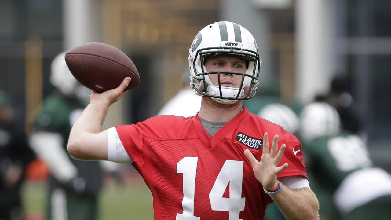 New York Jets quarterback Sam Darnold throws during practice at the NFL football team's training ca...