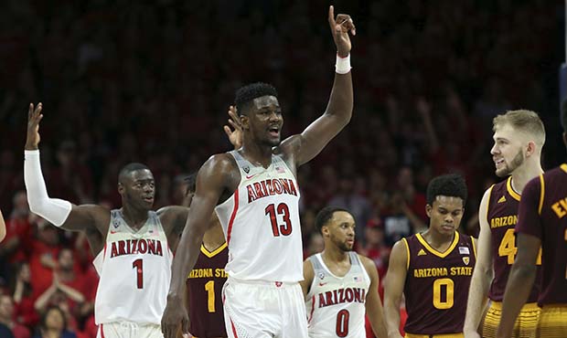 Arizona's Deandre Ayton (13) celebrate during the final seconds of their 84-78 victory over 3rd ran...