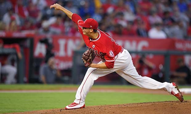 Los Angeles Angels starting pitcher Troy Scribner throws to the plate during the second inning of a...