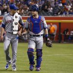 New York Mets starting pitcher Steven Matz, left, walks in from the bullpen after warming up with catcher Devin Mesoraco, right, prior to a baseball game against the Arizona Diamondbacks pm Saturday, June 16, 2018, in Phoenix. (AP Photo/Ross D. Franklin)