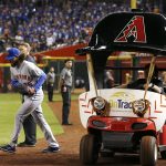 New York Mets relief pitcher Robert Gsellman exits the bullpen cart as he comes in to pitch against the Arizona Diamondbacks during the seventh inning of a baseball game Saturday, June 16, 2018, in Phoenix. (AP Photo/Ross D. Franklin)