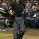 MLB umpire Jim Reynolds (77) ejects New York Mets relief pitcher Jason Vargas in the fourth inning during a baseball game against the Arizona Diamondbacks, Sunday, June 17, 2018, in Phoenix. Vargas was on the bench and not in the game. (AP Photo/Rick Scuteri)