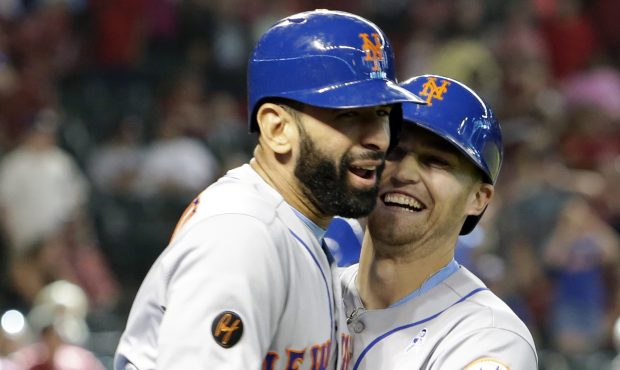 New York Mets' Brandon Nimmo, left, celebrates with Jose Bautista after hitting a two-run home run ...