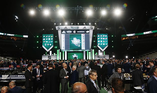 League and team officials are seen before the NHL hockey draft in Dallas, Friday, June 22, 2018. (A...