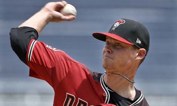 Arizona Diamondbacks starter Clay Buchholz pitches against the Pittsburgh Pirates in the first inni...