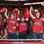 Fans react to a goal by Washington Capitals' Jakub Vrana, during a viewing party for Game 5 of the NHL hockey Stanley Cup Final between the Capitals and the Vegas Golden Knights, Thursday, June 7, 2018, in Washington. (AP Photo/Nick Wass)