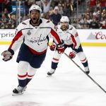 Washington Capitals right wing Devante Smith-Pelly, left, celebrates his goal, in front of center Chandler Stephenson during the third period in Game 5 of the NHL hockey Stanley Cup Finals against the Vegas Golden Knights on Thursday, June 7, 2018, in Las Vegas. (AP Photo/John Locher)