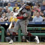 Arizona Diamondbacks' Jon Jay drives in two runs with a double off Pittsburgh Pirates starting pitcher Chad Kuhl during the second inning of a baseball game in Pittsburgh, Thursday, June 21, 2018. (AP Photo/Gene J. Puskar)