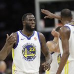 Golden State Warriors' Draymond Green and Kevin Durant celebrate during the second half of Game 4 of basketball's NBA Finals against the Golden State Warriors, Friday, June 8, 2018, in Cleveland. (AP Photo/Tony Dejak)