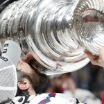 Washington Capitals left wing Alex Ovechkin, of Russia, kisses the Stanley Cup after the Capitals defeated the Golden Knights in Game 5 of the NHL hockey Stanley Cup Finals Thursday, June 7, 2018, in Las Vegas. (AP Photo/John Locher)