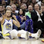 Golden State Warriors' Stephen Curry reacts to a call during the first half of Game 4 of basketball's NBA Finals against the Cleveland Cavaliers, Friday, June 8, 2018, in Cleveland. (AP Photo/Tony Dejak)