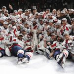 Washington Capitals pose with the Stanley Cup after the Capitals defeated the Golden Knights 4-3 in Game 5 of the NHL hockey Stanley Cup Finals Thursday, June 7, 2018, in Las Vegas. (AP Photo/John Locher)