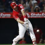 Los Angeles Angels' Mike Trout connects for a two-run single during the fifth inning of the team's baseball game against the Arizona Diamondbacks, Tuesday, June 19, 2018, in Anaheim, Calif. (AP Photo/Jae C. Hong)