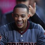 Arizona Diamondbacks' Ketel Marte is congratulated by teammates in the dugout after hitting a home run during the second inning of a baseball game against the Los Angeles Angels, Monday, June 18, 2018, in Anaheim, Calif. (AP Photo/Jae C. Hong)