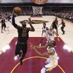 Cleveland Cavaliers' LeBron James shoots during the first half of Game 4 of basketball's NBA Finals against the Golden State Warriors, Friday, June 8, 2018, in Cleveland. (Gregory Shamus/Pool Photo via AP)