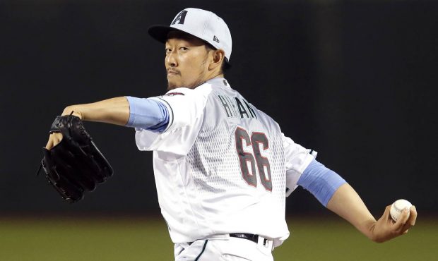 Arizona Diamondbacks pitcher Yoshihisa Hirano throws in the seventh inning during a baseball game a...