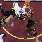 Cleveland Cavaliers' Jeff Green has his shot blocked by Golden State Warriors' Draymond Green during the first half of Game 4 of basketball's NBA Finals, Friday, June 8, 2018, in Cleveland. (AP Photo/Carlos Osorio, Pool)