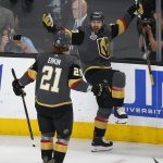 Vegas Golden Knights left wing Tomas Tatar, right, celebrates a goal by left wing David Perron with center Cody Eakin during the second period in Game 5 of the NHL hockey Stanley Cup Finals against the Washington Capitals on Thursday, June 7, 2018, in Las Vegas. (AP Photo/Ross D. Franklin)