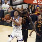Golden State Warriors' Stephen Curry shoots in front of Cleveland Cavaliers' Jeff Green during the second half of Game 4 of basketball's NBA Finals, Friday, June 8, 2018, in Cleveland. (AP Photo/Carlos Osorio)