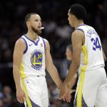 Golden State Warriors' Stephen Curry and Shaun Livingston react during the second half of Game 4 of basketball's NBA Finals against the Cleveland Cavaliers, Friday, June 8, 2018, in Cleveland. (AP Photo/Tony Dejak)