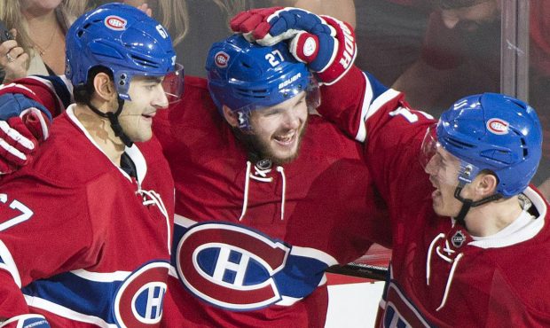 Montreal Canadiens' Alex Galchenyuk (27) celebrates with teammates Max Pacioretty (67) and Brendan ...