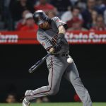 Arizona Diamondbacks' Jeff Mathis connects with a two-run double during the fourth inning of a baseball game against the Los Angeles Angels, Monday, June 18, 2018, in Anaheim, Calif. (AP Photo/Jae C. Hong)