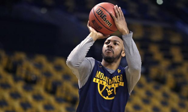 West Virginia's Jevon Carter shoots during practice at the NCAA men's college basketball tournament...