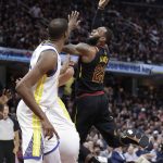 Cleveland Cavaliers' LeBron James shoots during the second half of Game 4 of basketball's NBA Finals against the Golden State Warriors, Friday, June 8, 2018, in Cleveland. (AP Photo/Tony Dejak)