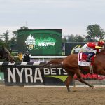 
              CORRECTS DAY AND DATE - Justify (1), with jockey Mike Smith up, crosses the finish line ahead of Gronkowski (6), with jockey Jose Ortiz up, to win the 150th running of the Belmont Stakes horse race and the Triple Crown, Saturday, June 9, 2018, in Elmont, N.Y. (AP Photo/Julie Jacobson)
            