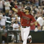 Arizona Diamondbacks' David Peralta reacts after hitting a solo home run against the Miami Marlins in the eighth inning during a baseball game, Sunday, June 3, 2018, in Phoenix. (AP Photo/Rick Scuteri)