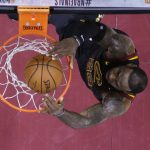 Cleveland Cavaliers' LeBron James dunks during the first half of Game 4 of basketball's NBA Finals against the Golden State Warriors, Friday, June 8, 2018, in Cleveland. (AP Photo/Carlos Osorio, Pool)