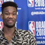 Arizona's Deandre Ayton speaks to reporters during a media availability with the top basketball prospects in the NBA Draft, Wednesday, June 20, 2018, in New York. (AP Photo/Mary Altaffer)