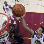 Golden State Warriors' Shaun Livingston (34) and Cleveland Cavaliers' Jeff Green vie for a rebound during the first half of Game 4 of basketball's NBA Finals, Friday, June 8, 2018, in Cleveland. (Kyle Terada/Pool Photo via AP)
