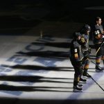 Members of the Vegas Golden Knights line up for the national anthem prior to Game 5 of the NHL hockey Stanley Cup Finals against the Washington Capitals on Thursday, June 7, 2018, in Las Vegas. (AP Photo/Ross D. Franklin)