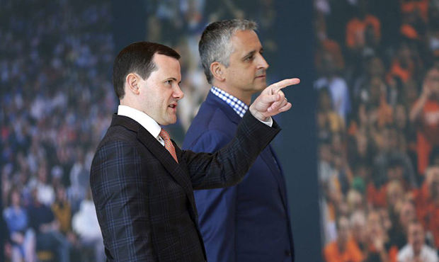 Phoenix Suns new head coach Igor Kokoskov, right, arrives with general manager Ryan McDonough to sp...