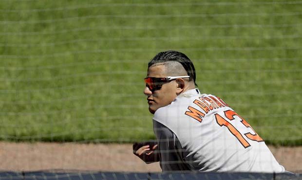 Baltimore Orioles' Manny Machado sits in the dugout during the second inning of a baseball game aga...