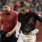Arizona Diamondbacks shortstop Ketel Marte limps to the dugout after being thrown out at first during the seventh inning of a baseball game against the San Francisco Giants on Saturday, June 30, 2018, in Phoenix. Marte left the game. (AP Photo/Matt York)