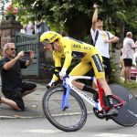 Britain's Geraint Thomas, wearing the overall leader's yellow jersey, rides during the twentieth stage of the Tour de France cycling race, an individual time trial over 31 kilometers (19.3 miles)with start in Saint-Pee-sur-Nivelle and finish in Espelette, France, Saturday July 28, 2018. (AP Photo/Bob Edmee)