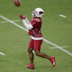 Arizona Cardinals Christian Kirk (13) catches the ball during the first day of NFL football training camp, Saturday, July 28, 2018, in Glendale, Ariz. (AP Photo/Matt York)
