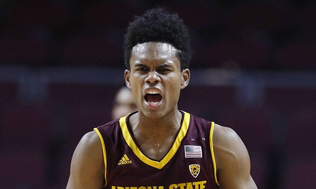 Arizona State's Tra Holder reacts after a play against Xavier during the first period of an NCAA co...