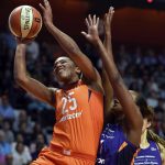 Connecticut Sun forward Alyssa Thaoms (25) shoots over Phoenix Mercury forward Angel Robinson in the first half of WNBA basketball game action Friday, July 13, 2018, in Uncasville, Conn.. (Sean D. Elliot/The Day via AP)/The Day via AP)