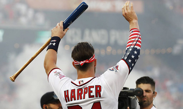 Washington Nationals Bryce Harper (34) waves to fans during the MLB Home Run Derby, at Nationals Pa...