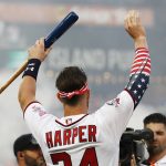 Washington Nationals Bryce Harper (34) waves to fans during the MLB Home Run Derby, at Nationals Park, Monday, July 16, 2018 in Washington. The 89th MLB baseball All-Star Game will be played Tuesday. (AP Photo/Alex Brandon)