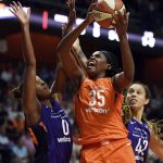Connecticut Sun center Jonquel Jones (35) battles Phoenix Mercury defenders Angel Robinson (0) and Brittney Griner (42) in the first half of WNBA basketball game action Friday, July 13, 2018, in Uncasville, Conn.. (Sean D. Elliot/The Day via AP)/The Day via AP)