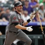 Arizona Diamondbacks center fielder A.J. Pollock reacts after flying out against Colorado Rockies starting pitcher Kyle Freeland in the third inning of a baseball game Thursday, July 12, 2018, in Denver. (AP Photo/David Zalubowski)
