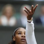 Serena Williams of the US serves to Angelique Kerber of Germany during the women's singles final match at the Wimbledon Tennis Championships, in London, Saturday July 14, 2018. (Nic Bothma, Pool via AP)